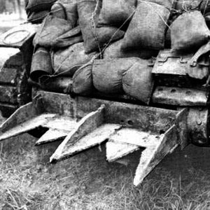 Hedgerow Cutter on M5 light tank.jpeg