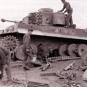 tiger-tank-with-its-road-wheels-and-tracks-removed.jpg